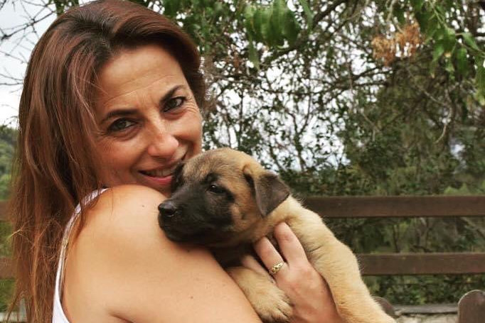 Marga con cachorro malinois